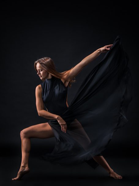 young-beautiful-dancer-beige-dress-dancing-black-wall